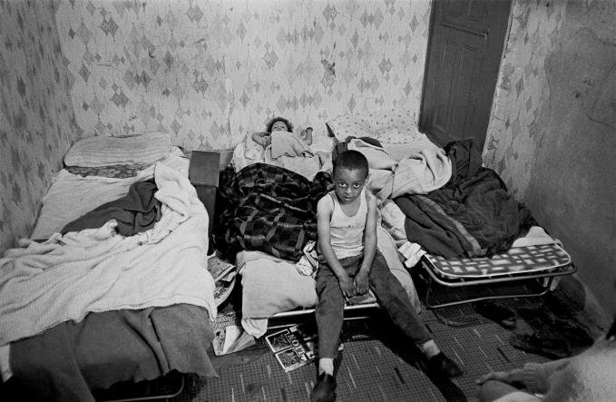 Bedroom of a grossly overcrowded house in Liverpool 8 1971 
